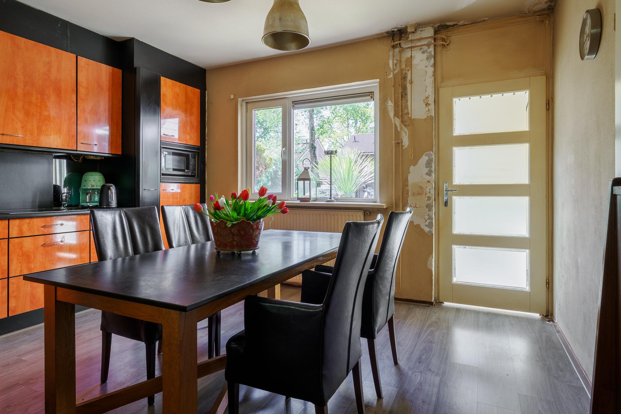 Tussenwoning te koop: Kemnalanden 27, Enschede