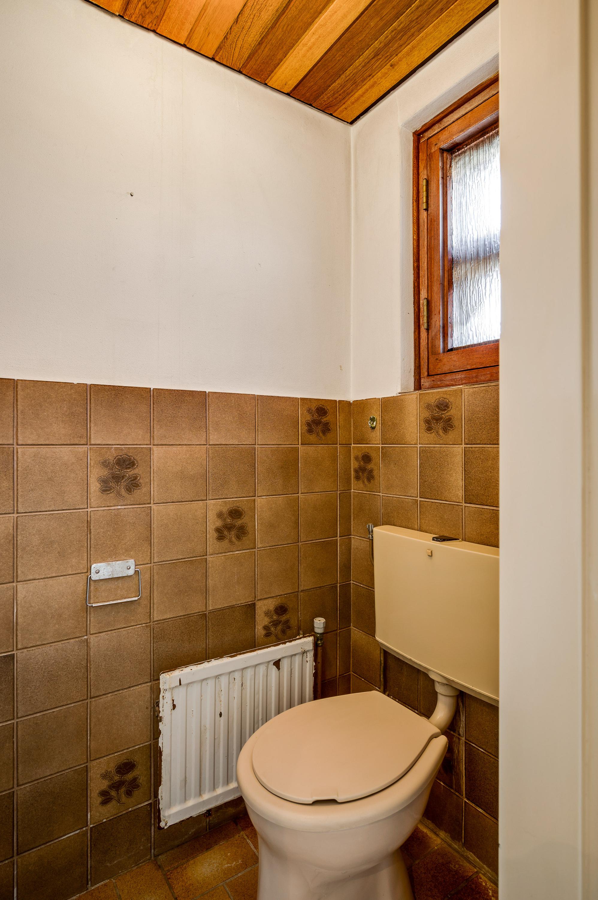 Tussenwoning te koop: Brugstraat 15, Roggel