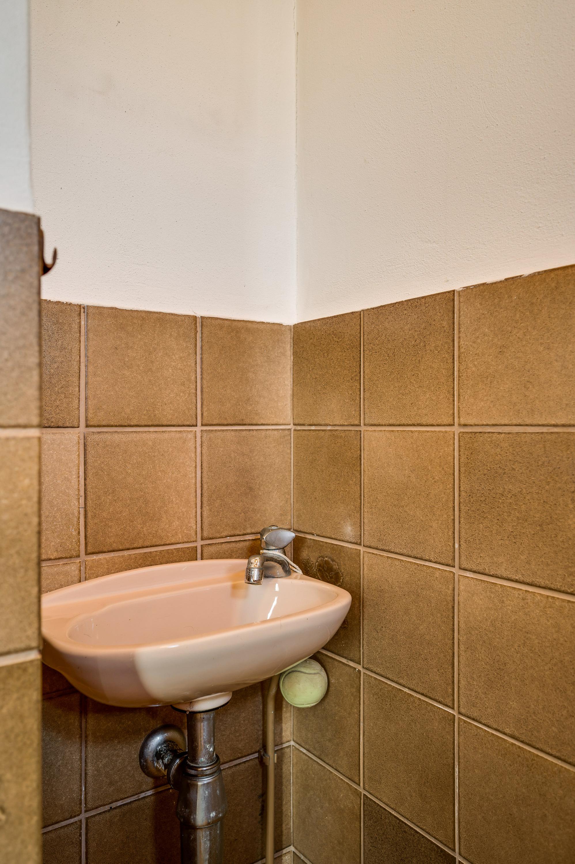 Tussenwoning te koop: Brugstraat 15, Roggel