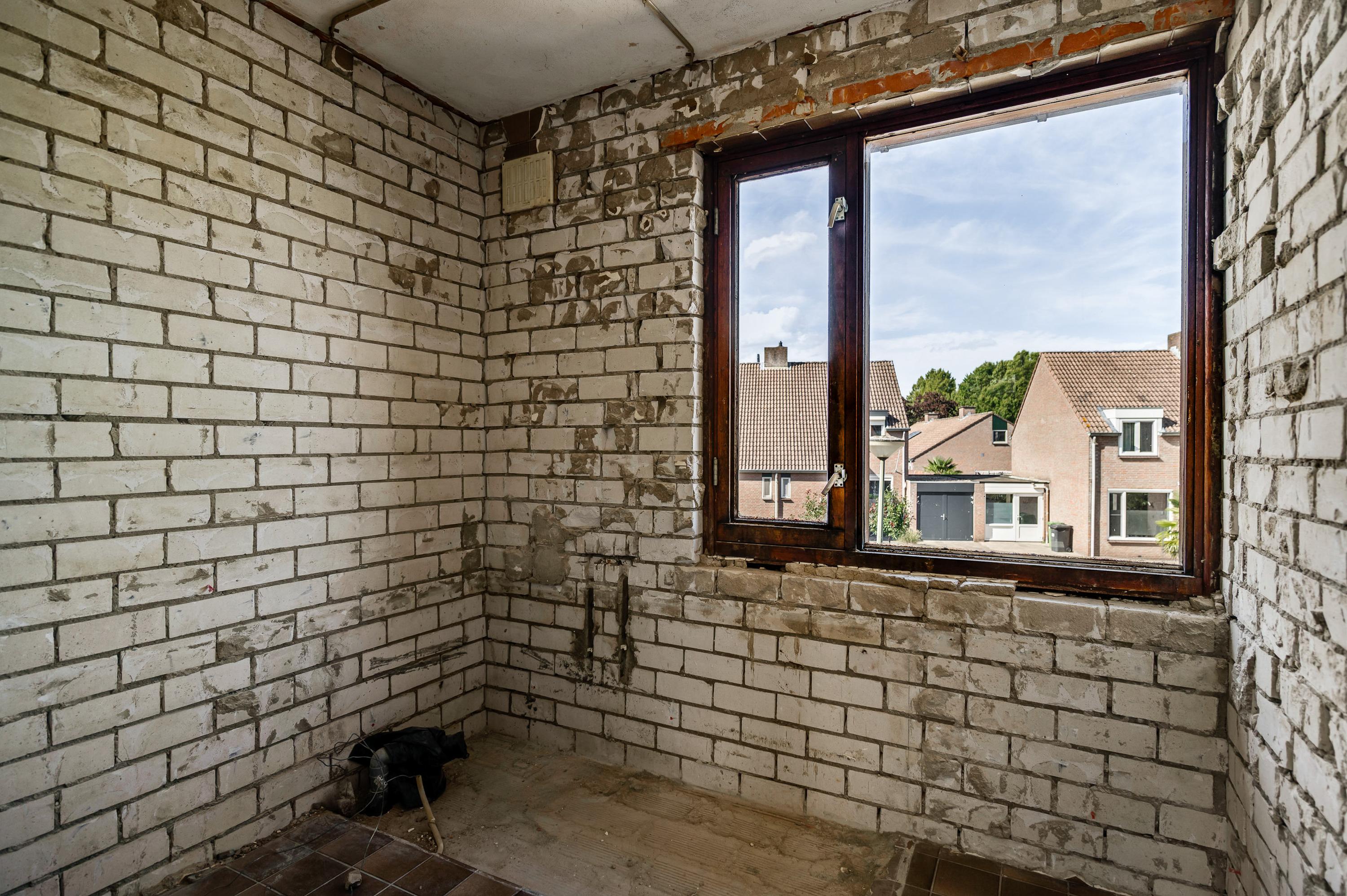 Tussenwoning te koop: Brugstraat 15, Roggel