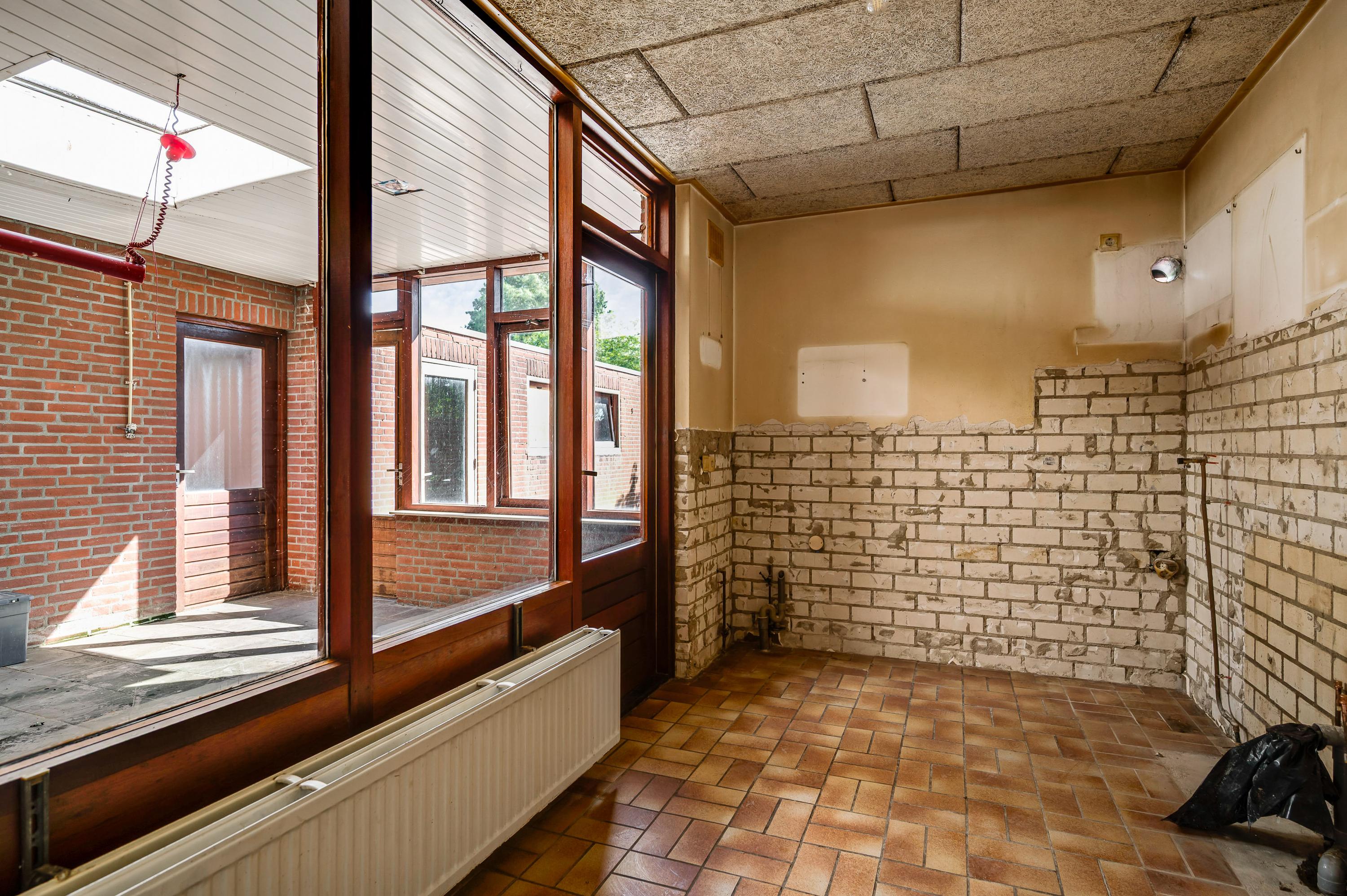 Tussenwoning te koop: Brugstraat 15, Roggel
