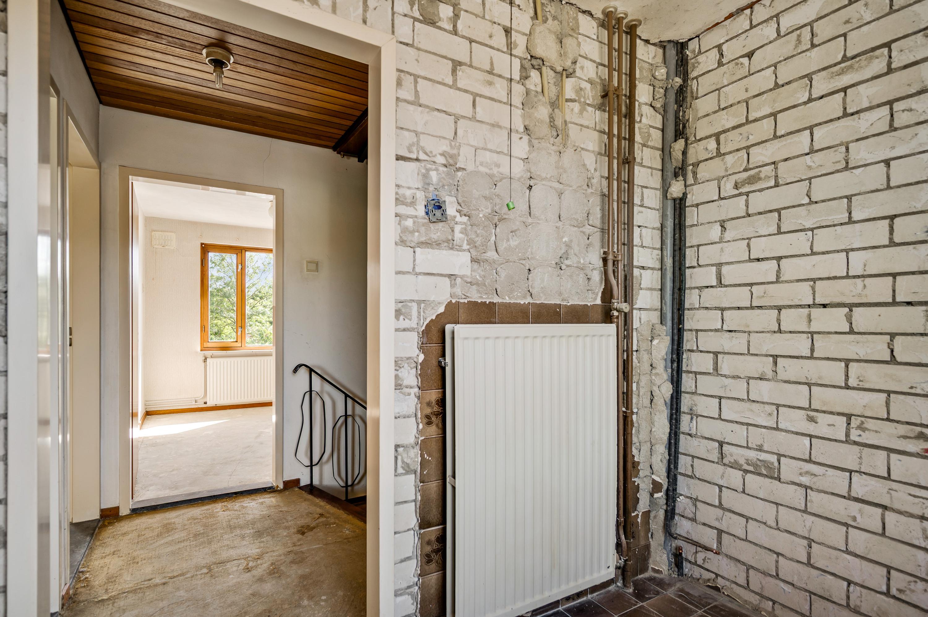 Tussenwoning te koop: Brugstraat 15, Roggel