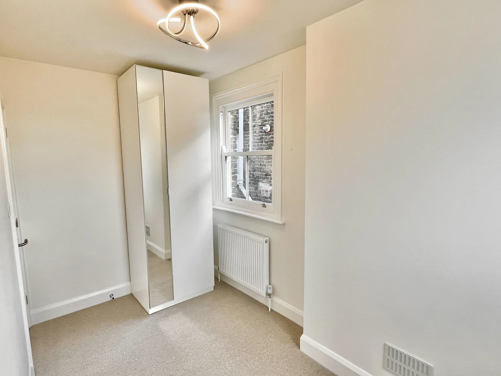 Flat Lammas Park Road in Greater London