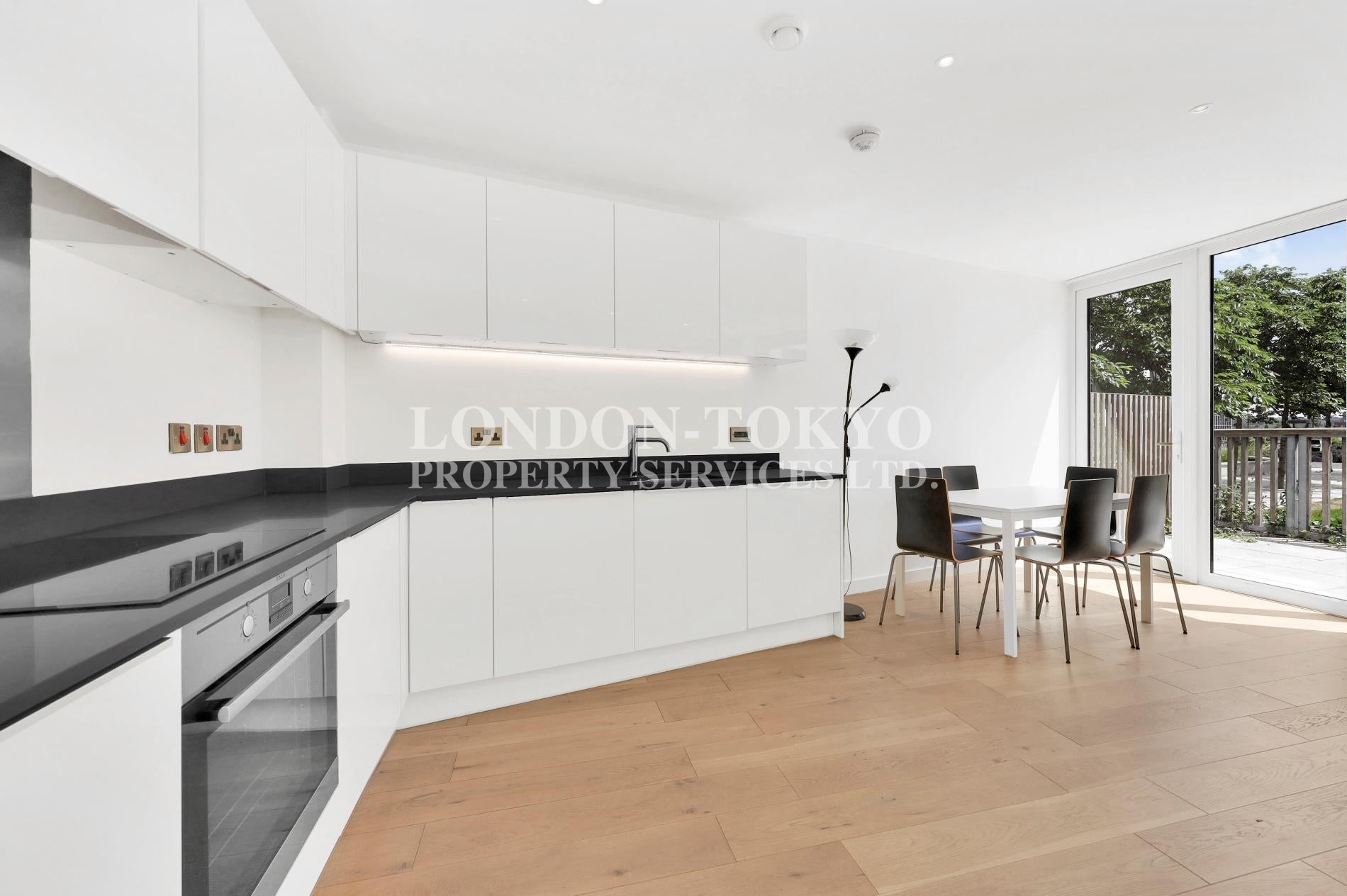 Flat Capitol Way in Greater London