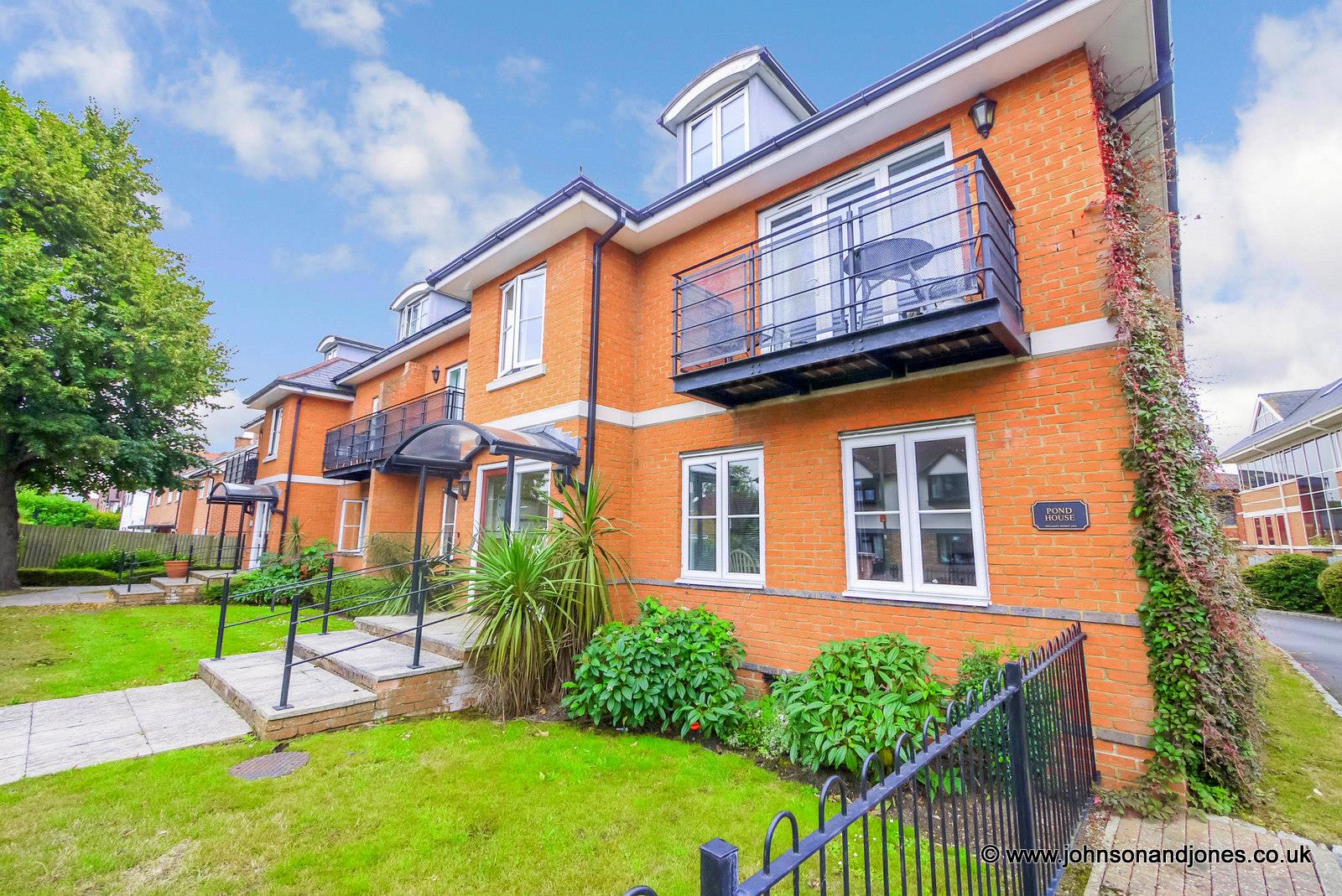 Flat Abbey Road in Borough of Runnymede