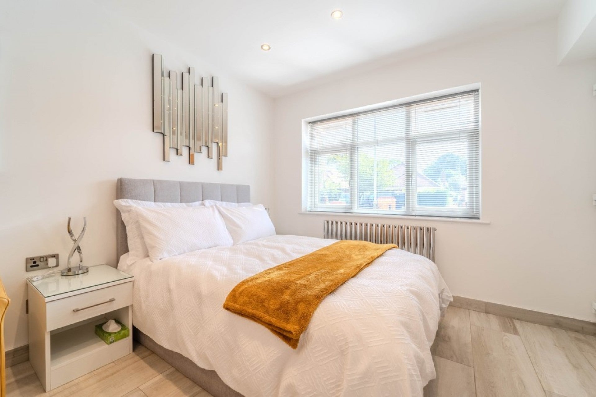 Flat Holland Gardens in Borough of Runnymede