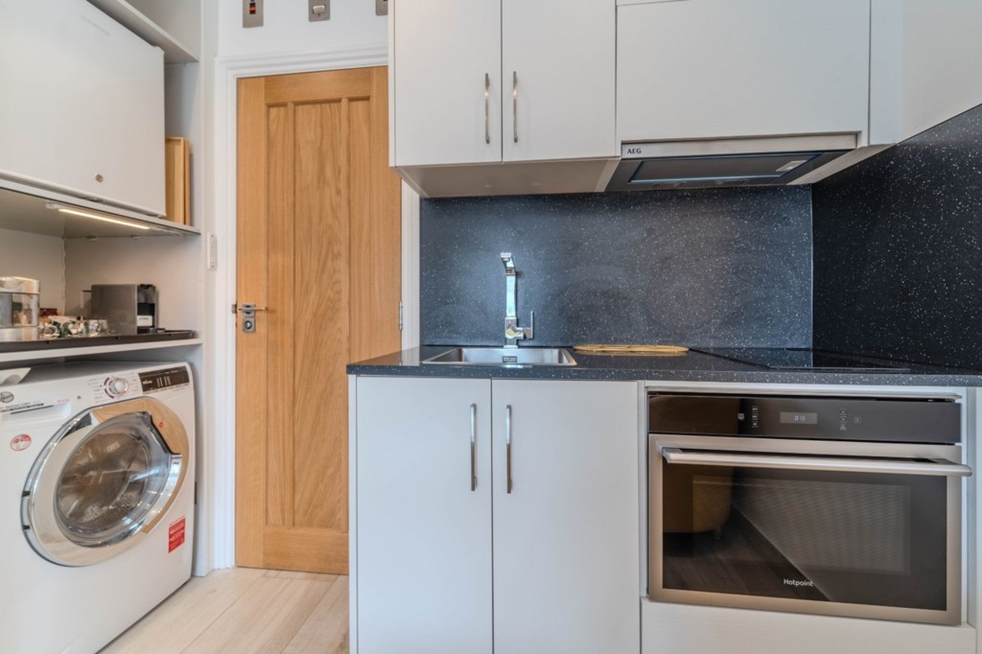 Flat Holland Gardens in Borough of Runnymede