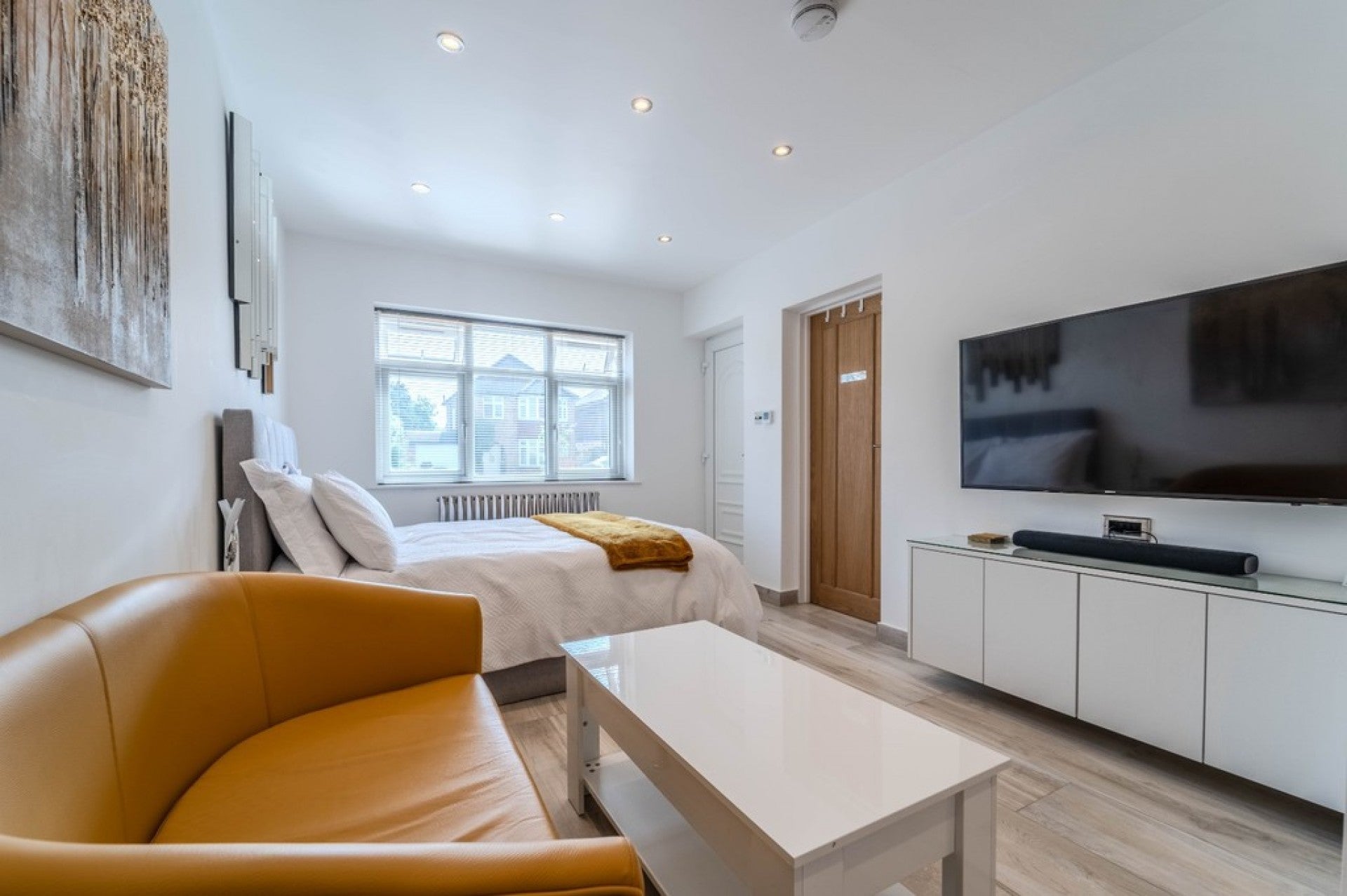 Flat Holland Gardens in Borough of Runnymede