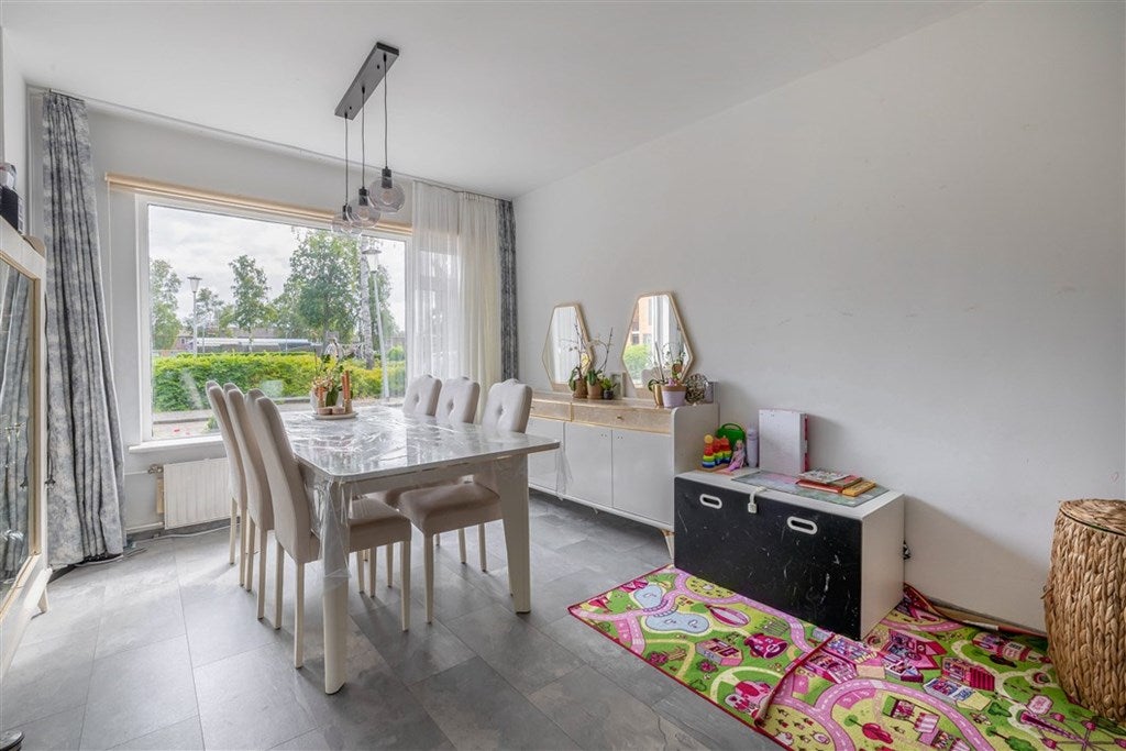 Tussenwoning te koop: Troelstrastraat 4, Veendam