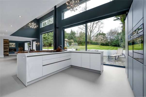 House Courtlands Avenue in Elmbridge