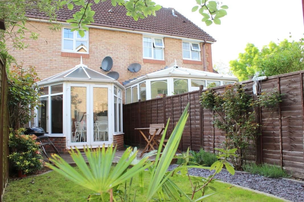 House Sandhills Lane in Borough of Runnymede