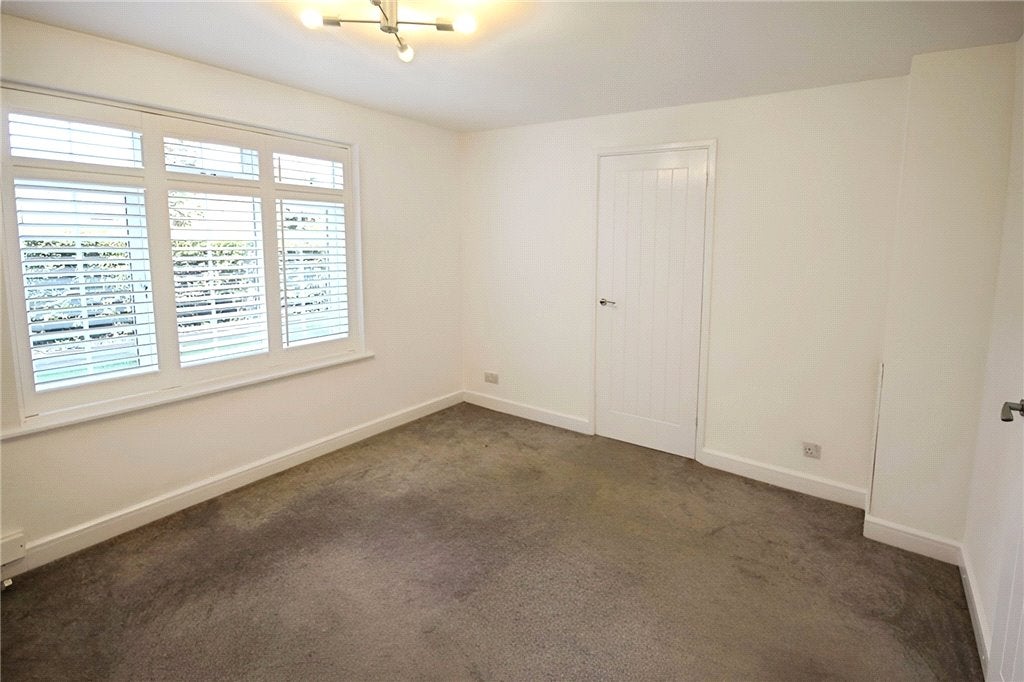 Flat Hazelbank Road in Borough of Runnymede