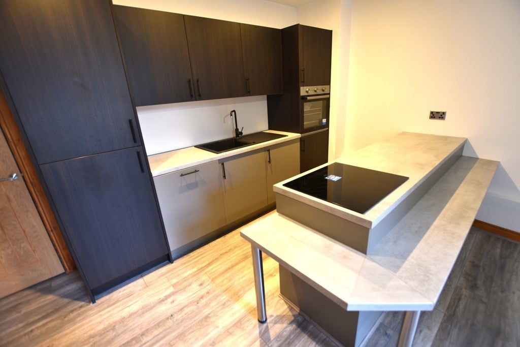 Flat Brackley Street in Farnworth