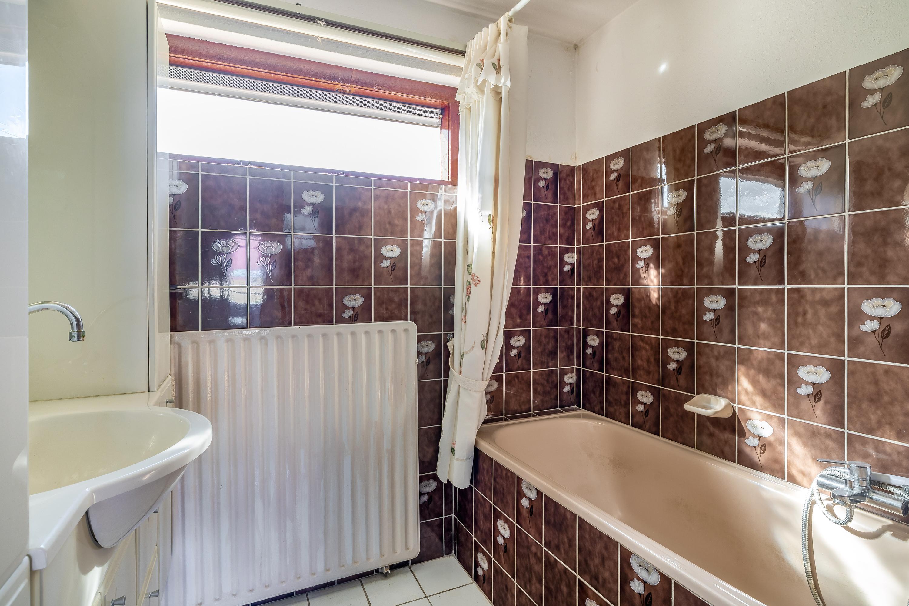 Tussenwoning te koop: Kamperlandsingel 7, Rotterdam