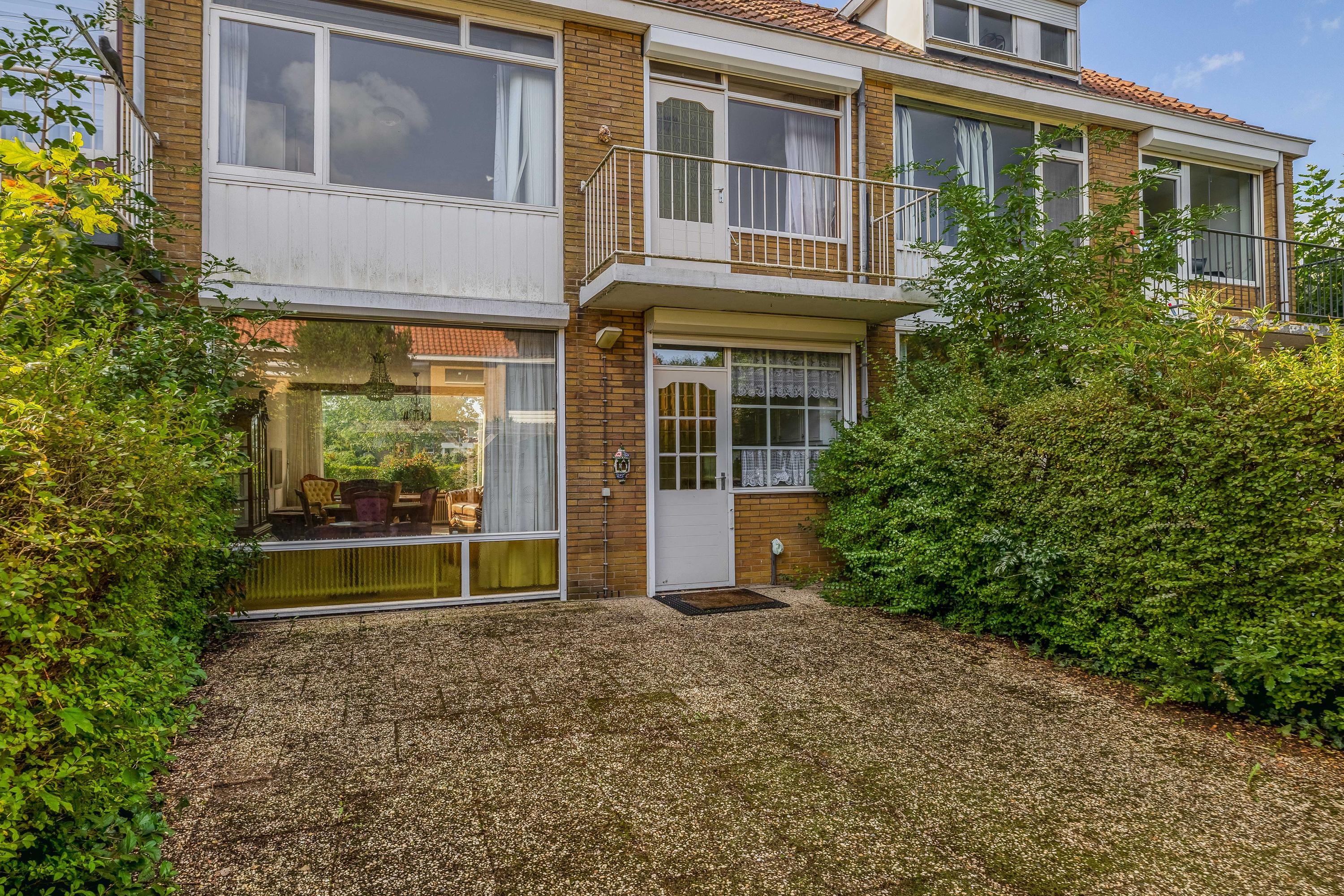 Tussenwoning te koop: Kamperlandsingel 7, Rotterdam