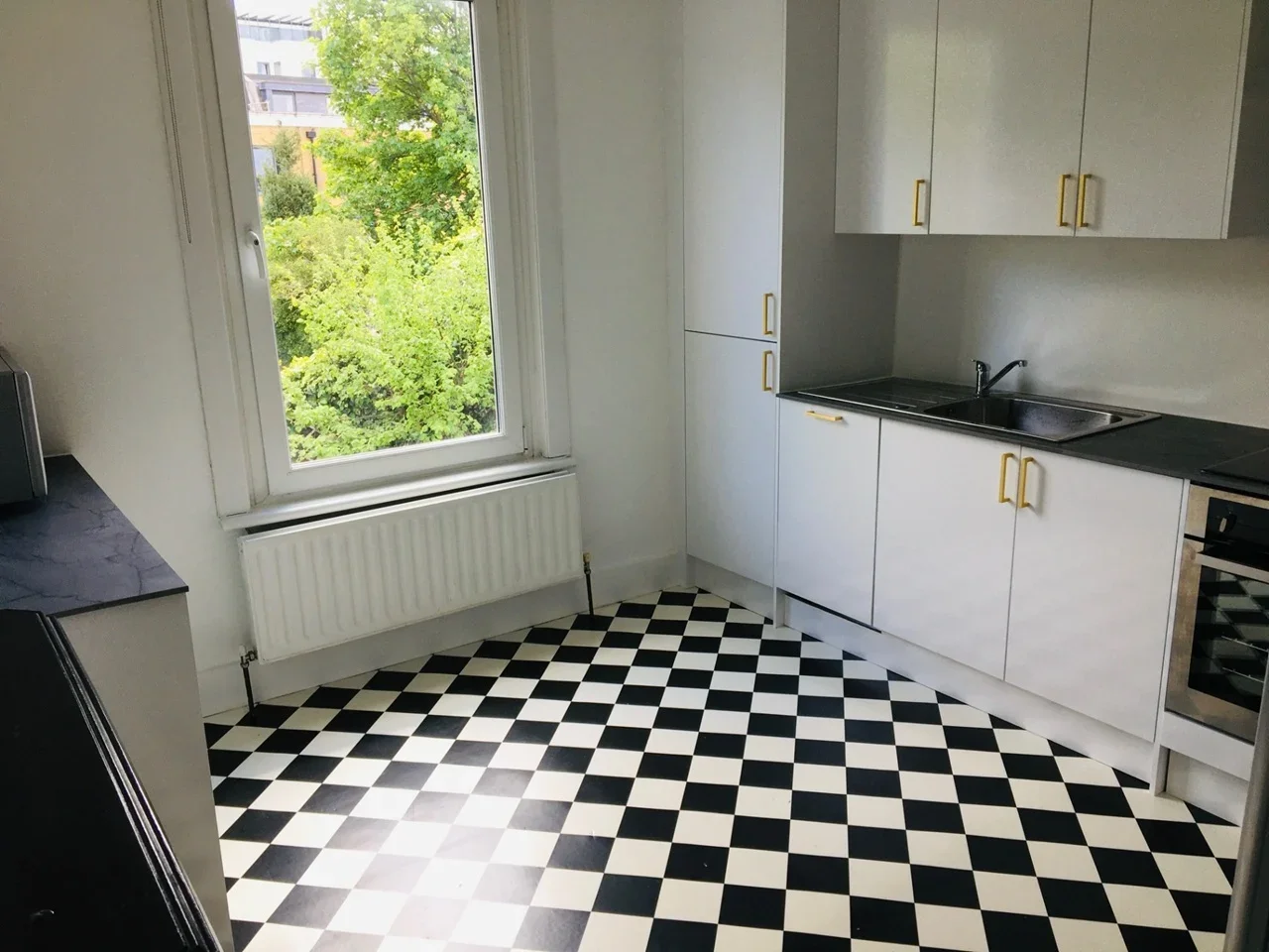 Flat Denmark Road in Greater London