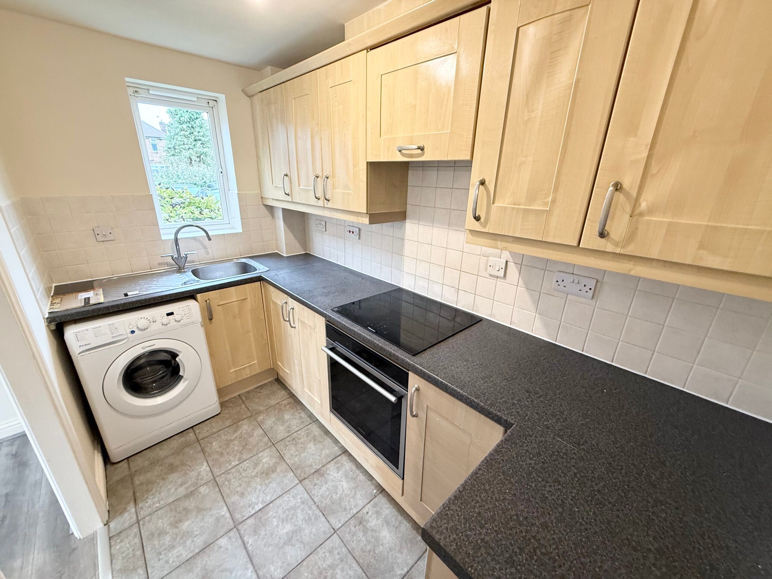 Flat Peterhouse Close in Peterborough