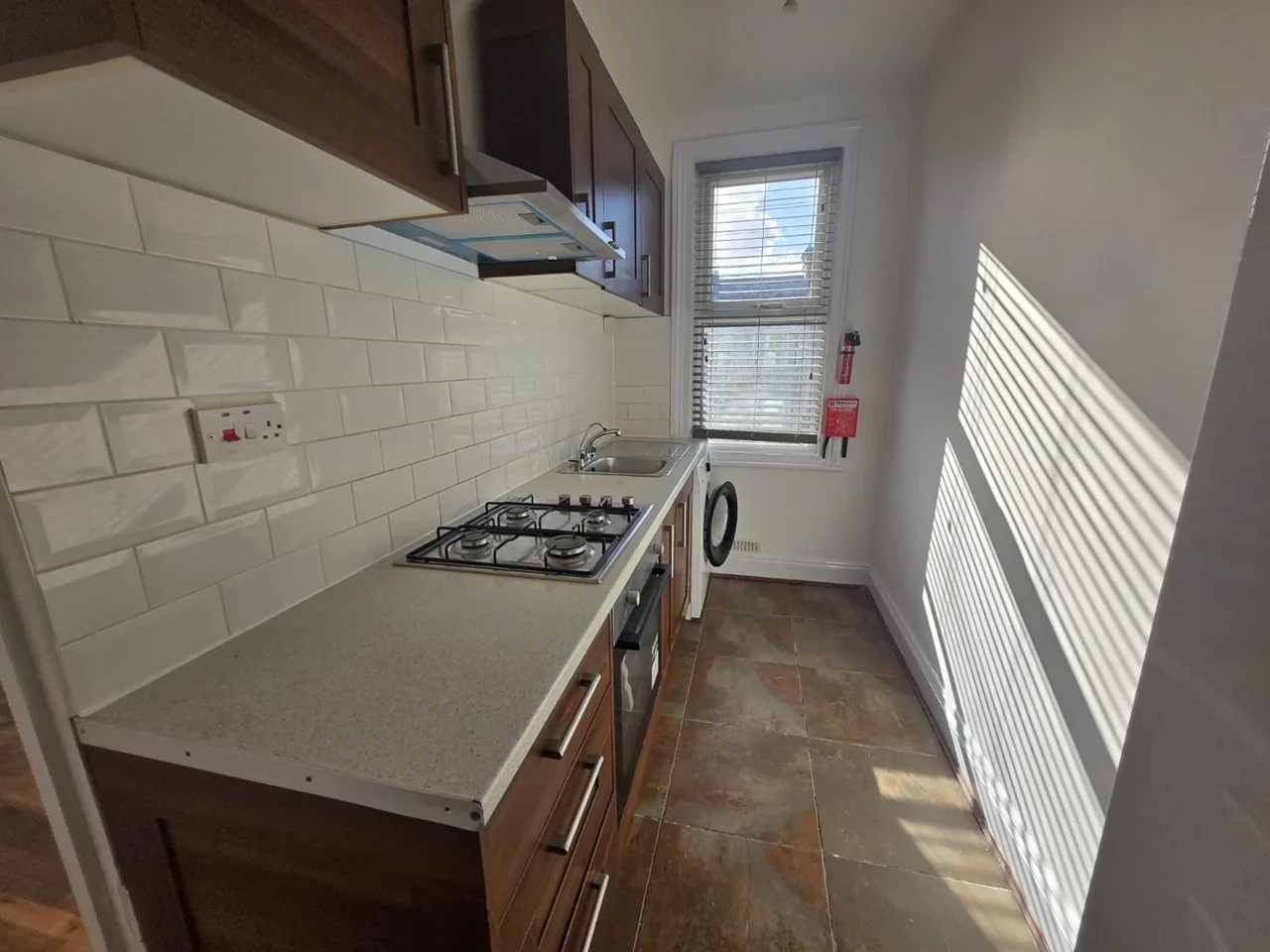 Flat Woodhouse Road in Greater London