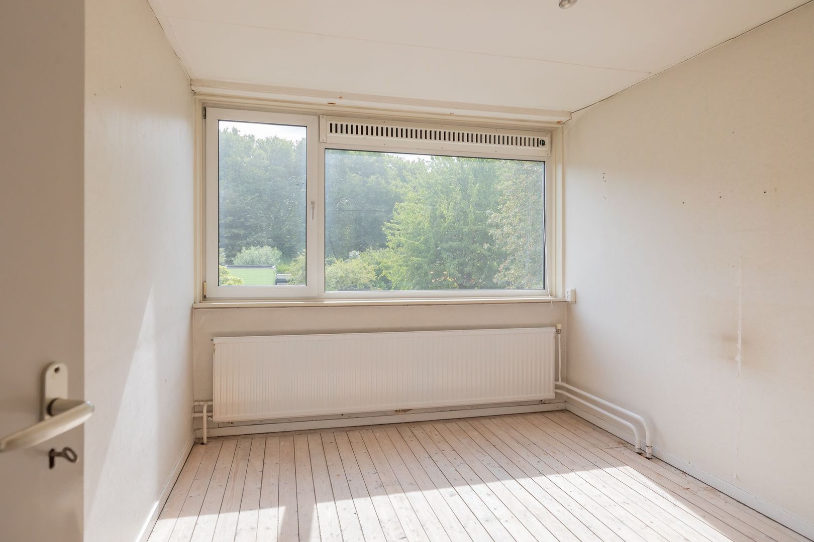 Tussenwoning te koop: Plantsoenlaan 21, Zwanenburg