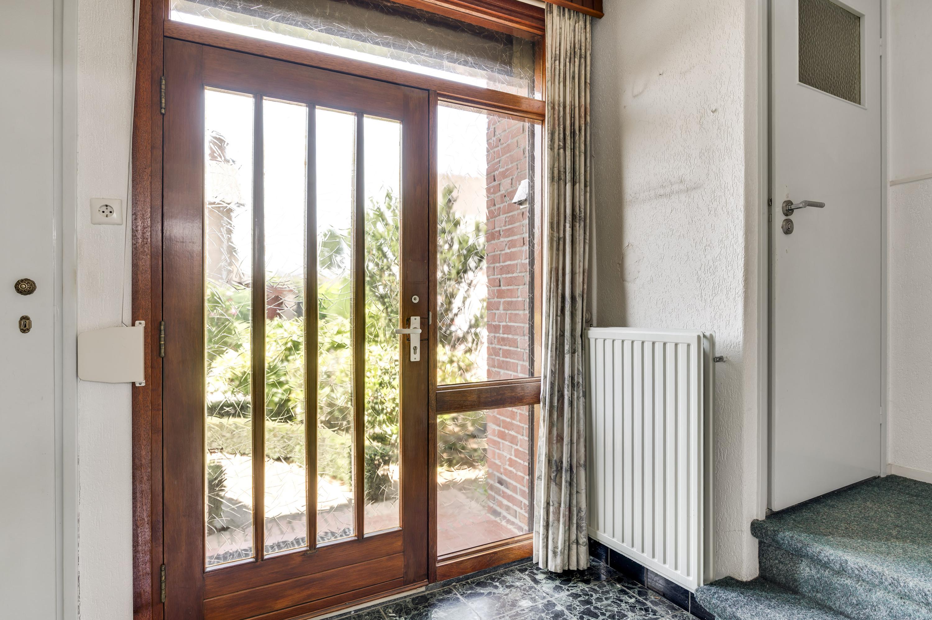 Twee-onder-één-kap te koop: Burg. van Udenstraat 3B, Nederweert