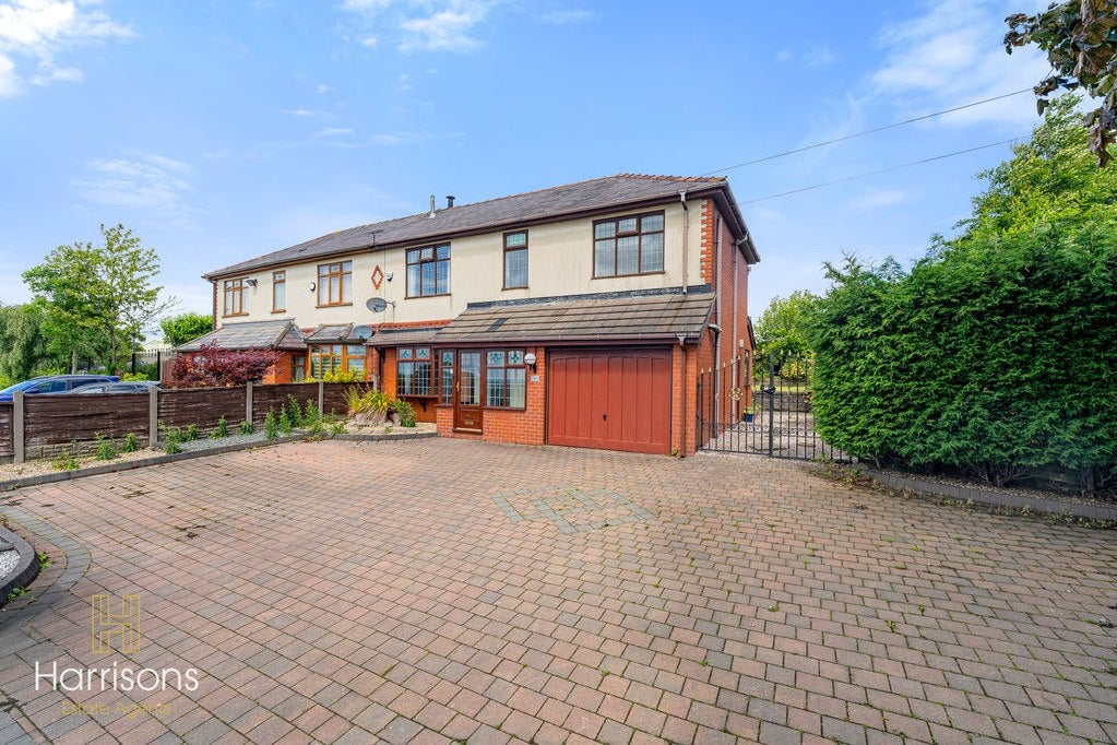 House Plodder Lane in Farnworth