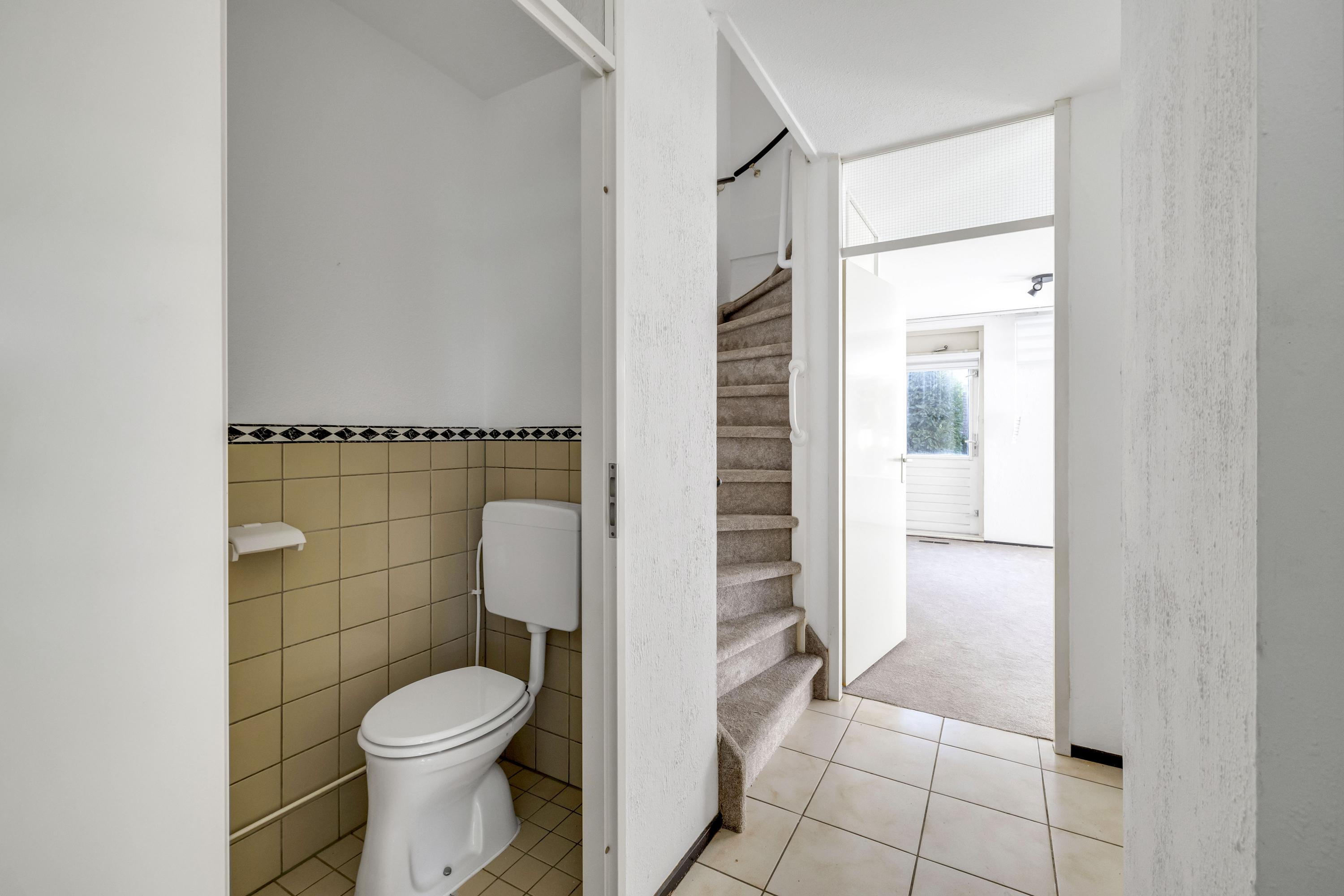 Tussenwoning te koop: Harkje Benthempad 31, Schiedam