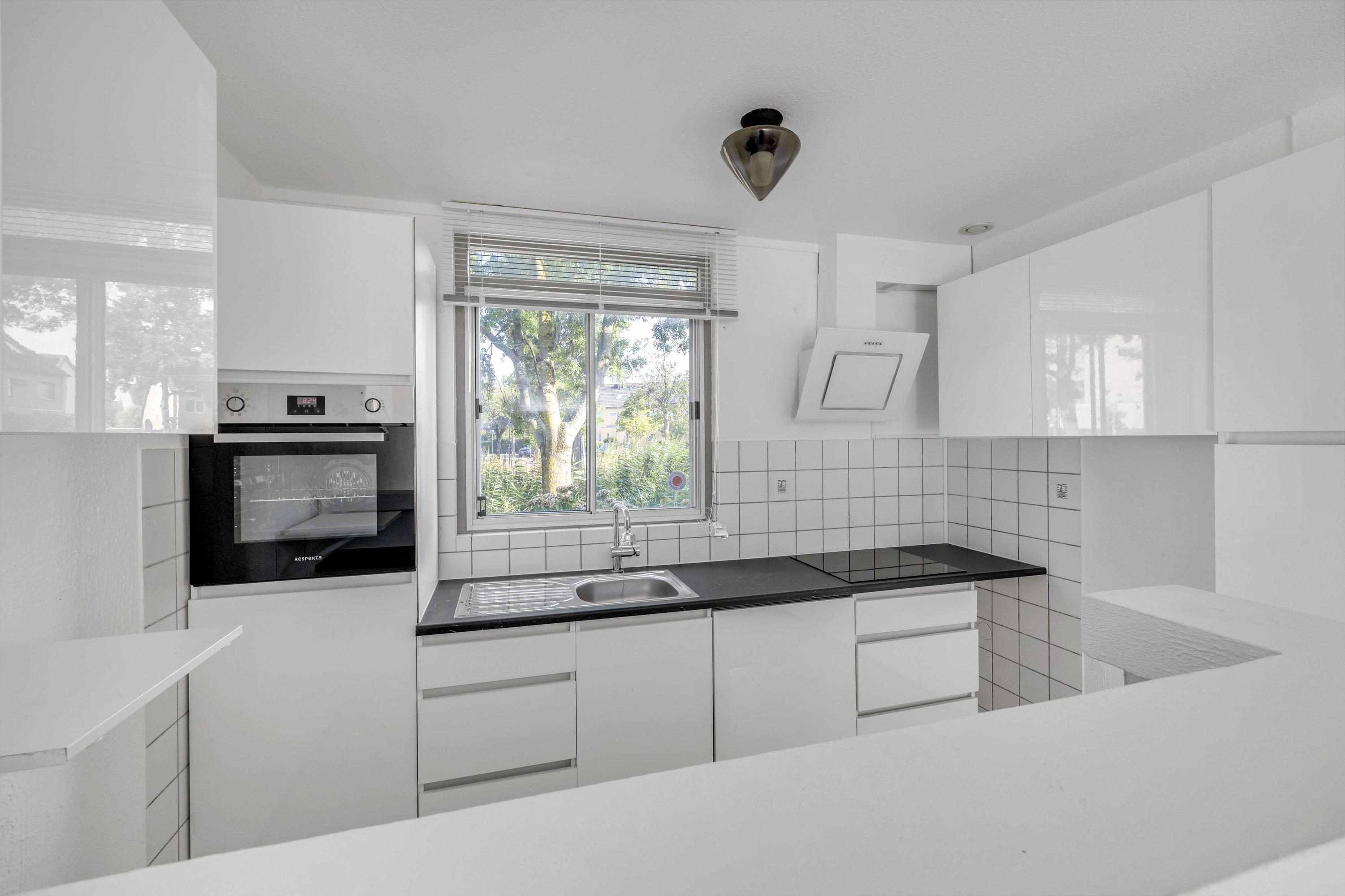 Tussenwoning te koop: Harkje Benthempad 31, Schiedam