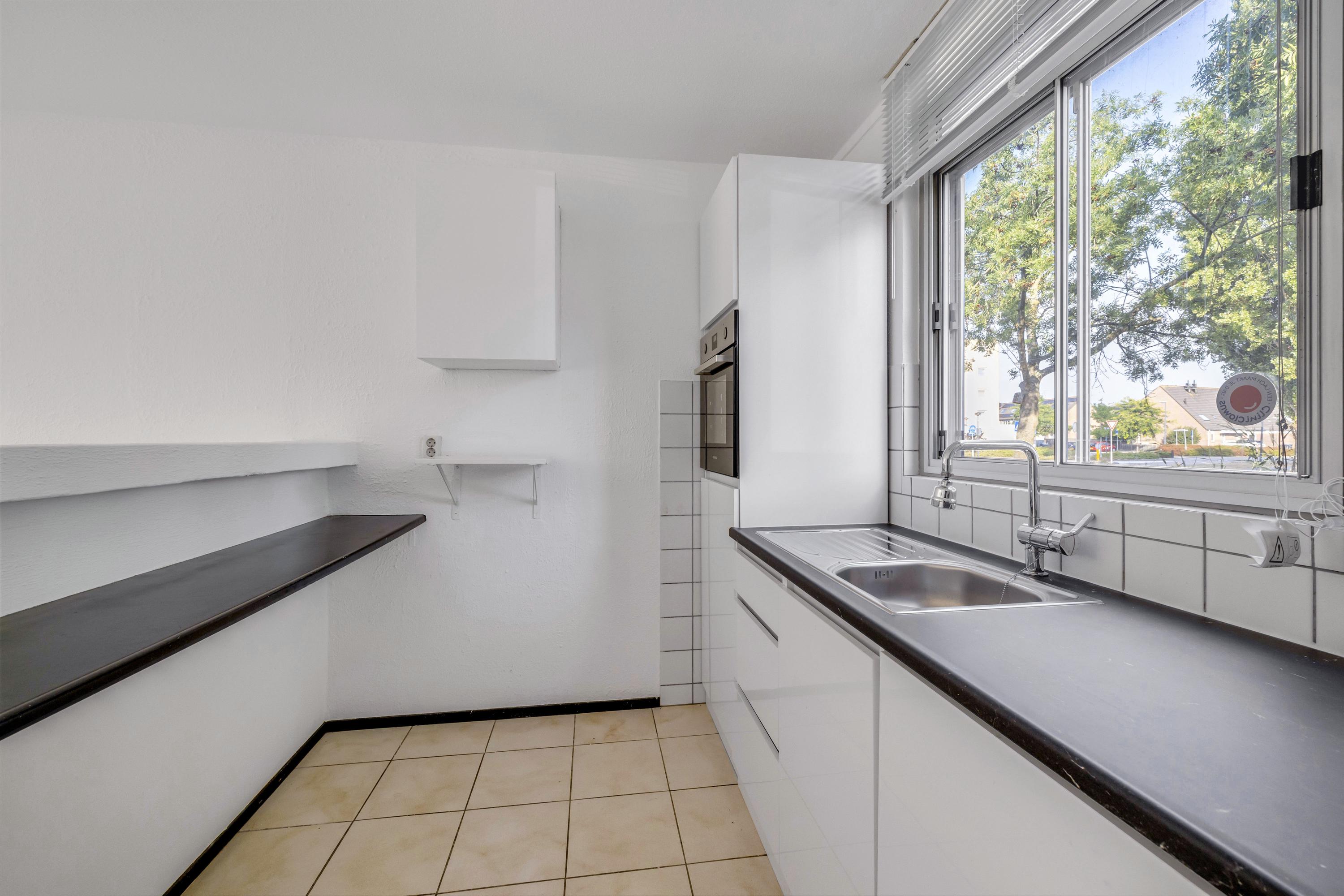 Tussenwoning te koop: Harkje Benthempad 31, Schiedam