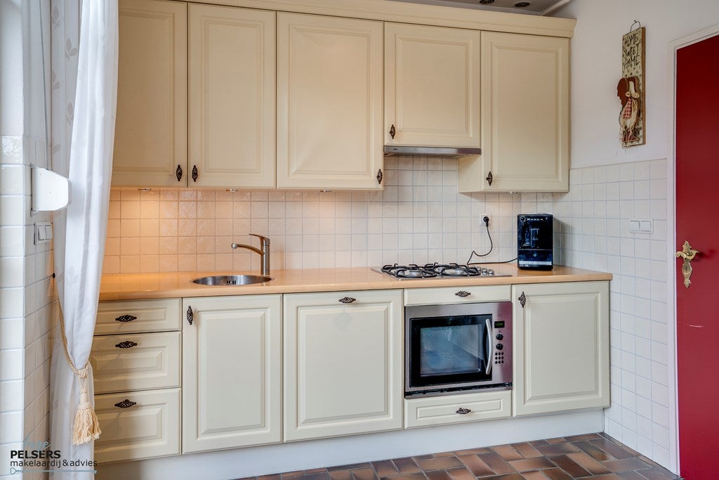 Twee-onder-één-kap te koop: Prins Clausstraat 58, Reuver
