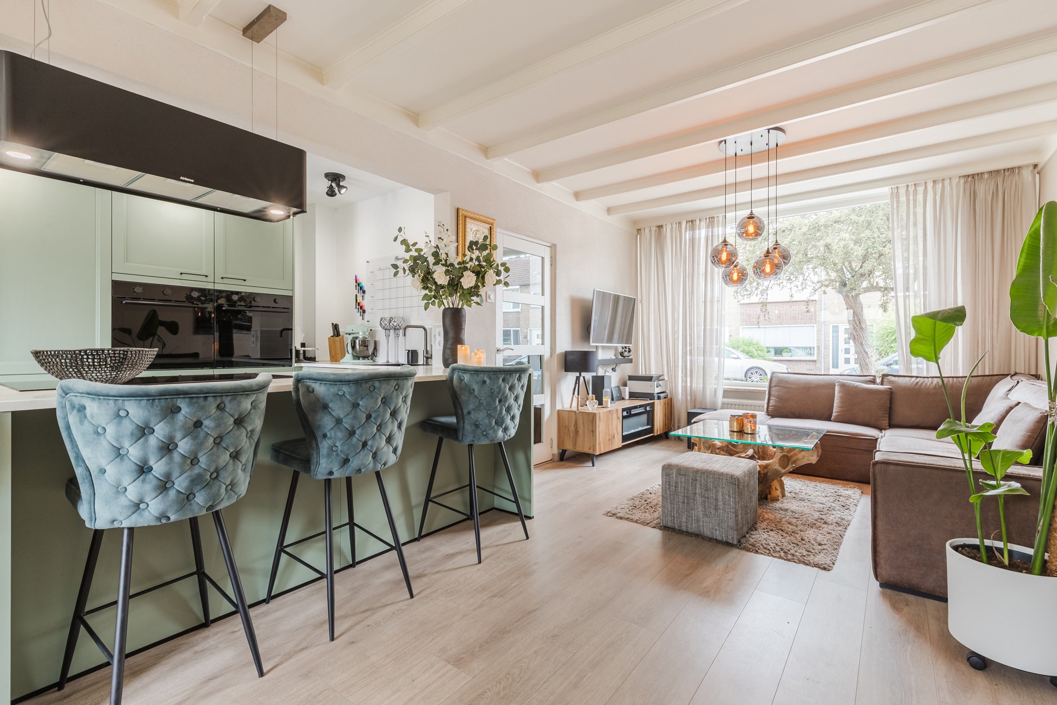 Tussenwoning te koop: Dr Ensinkstraat 16, Halsteren
