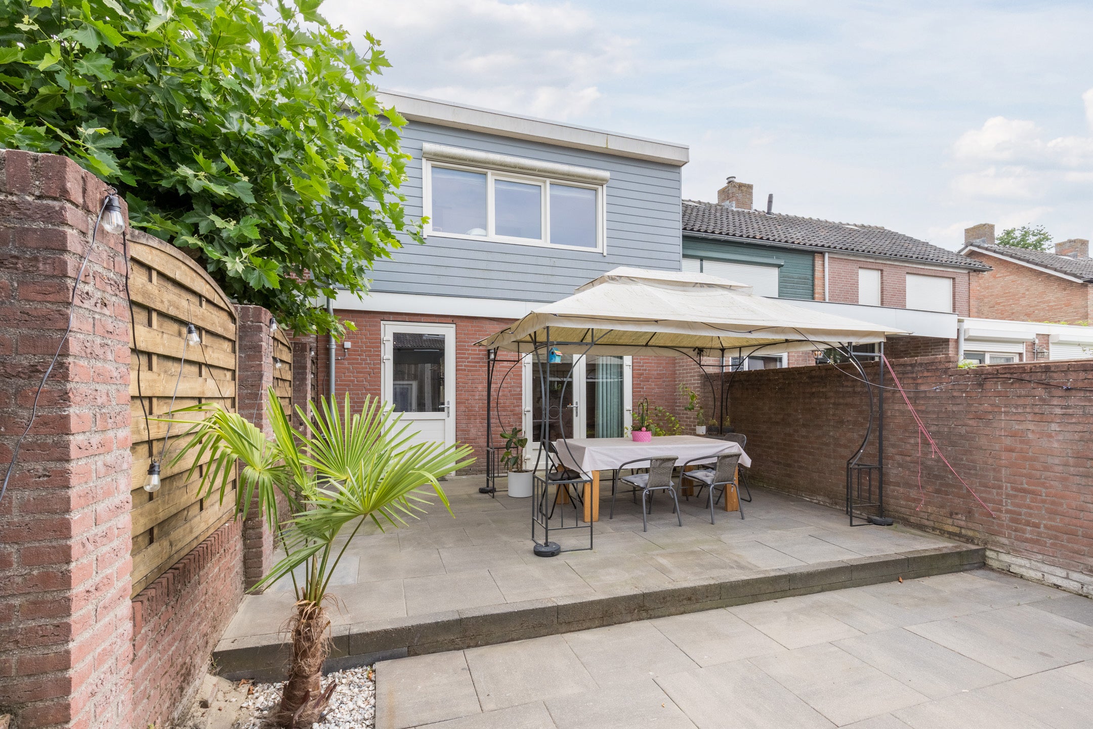 Tussenwoning te koop: Dr Ensinkstraat 16, Halsteren