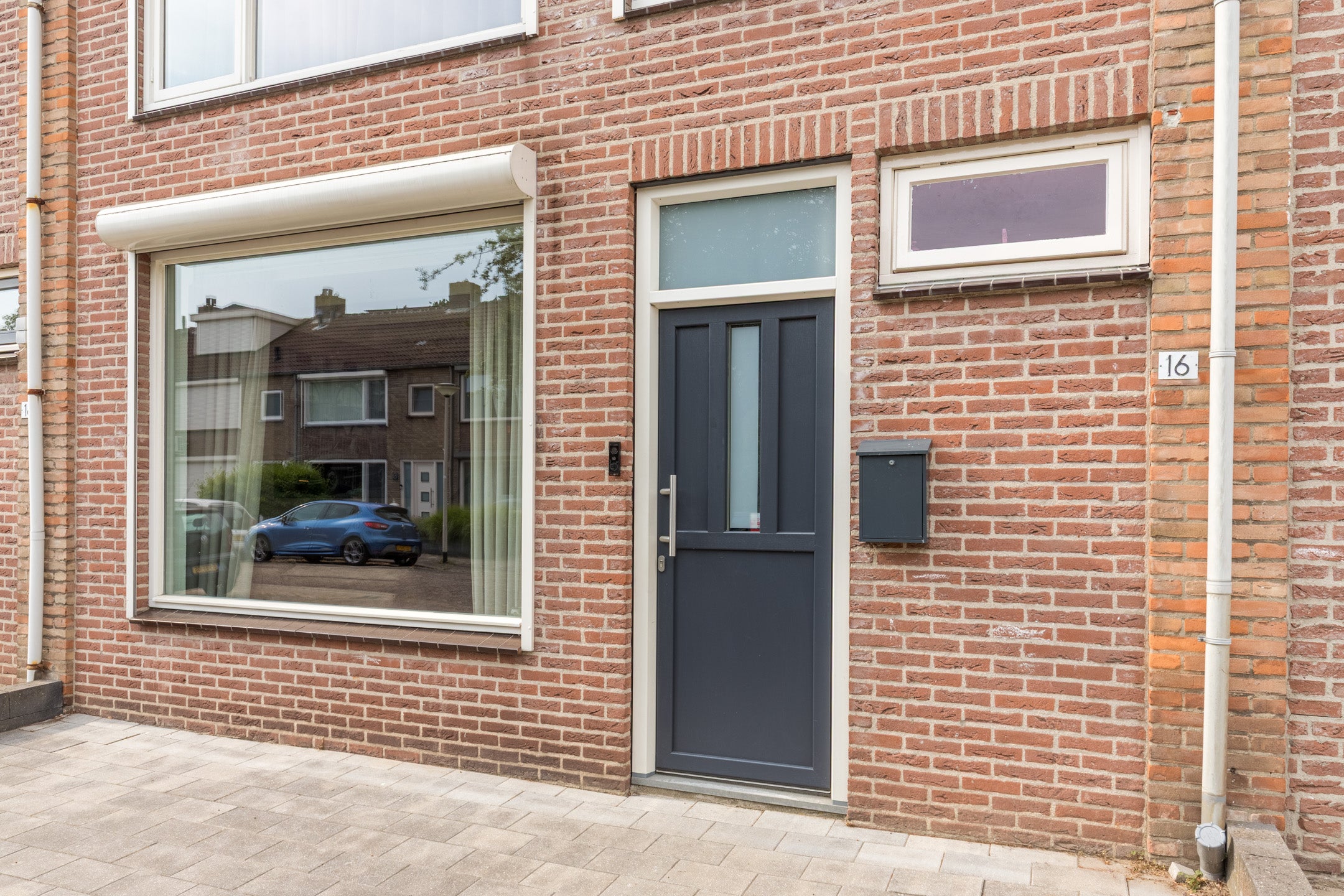 Tussenwoning te koop: Dr Ensinkstraat 16, Halsteren