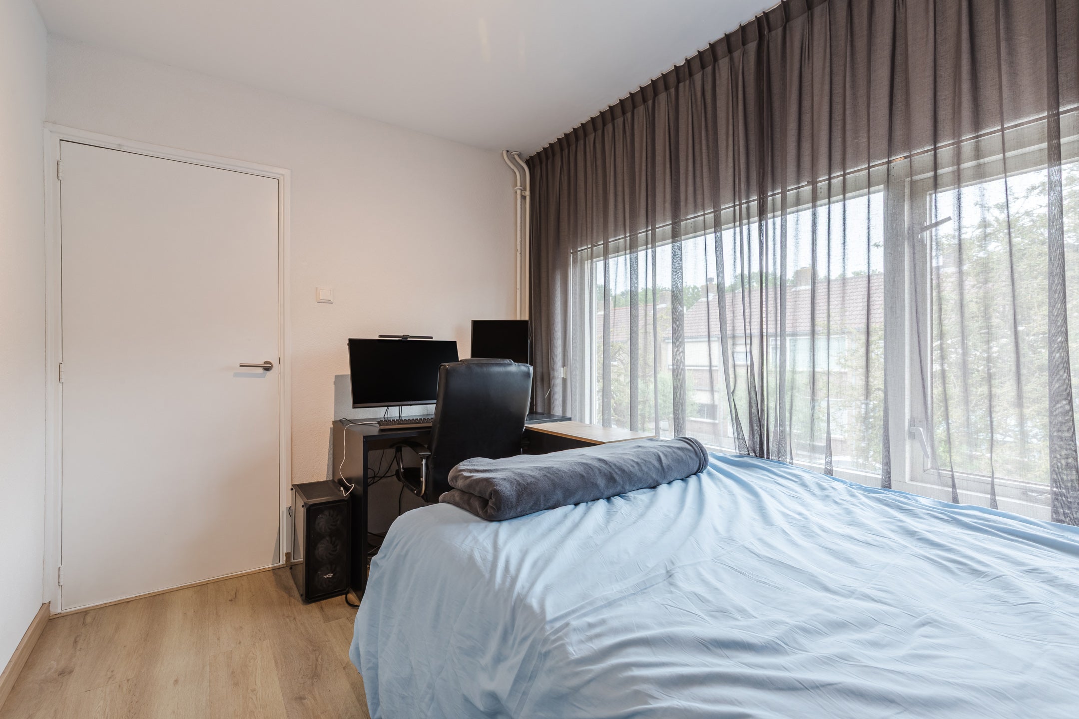 Tussenwoning te koop: Dr Ensinkstraat 16, Halsteren