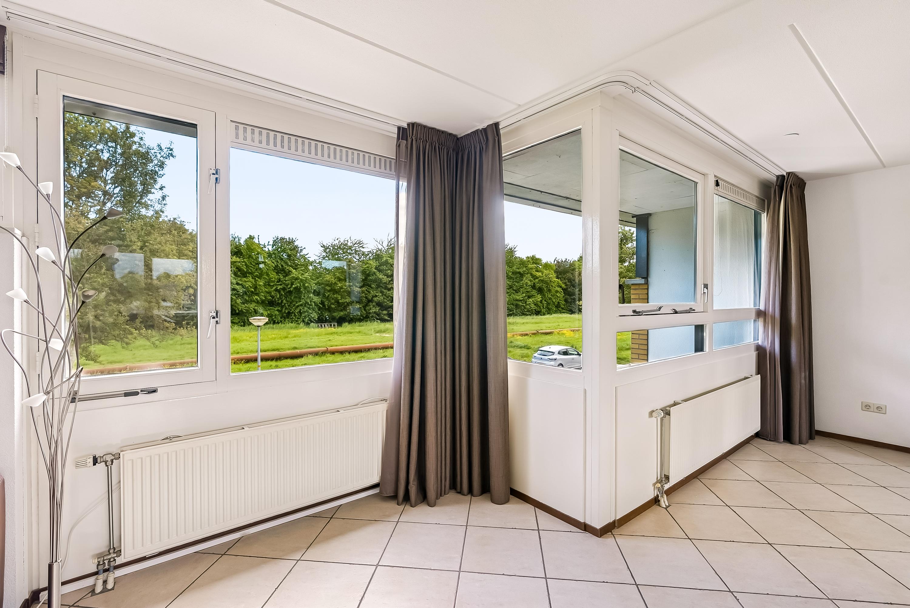 Tussenwoning te koop: Carel Willinklaan 18, Almere