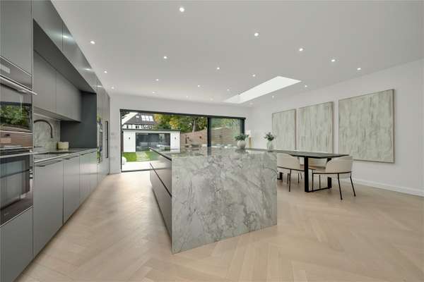 House Couchmore Avenue in Elmbridge