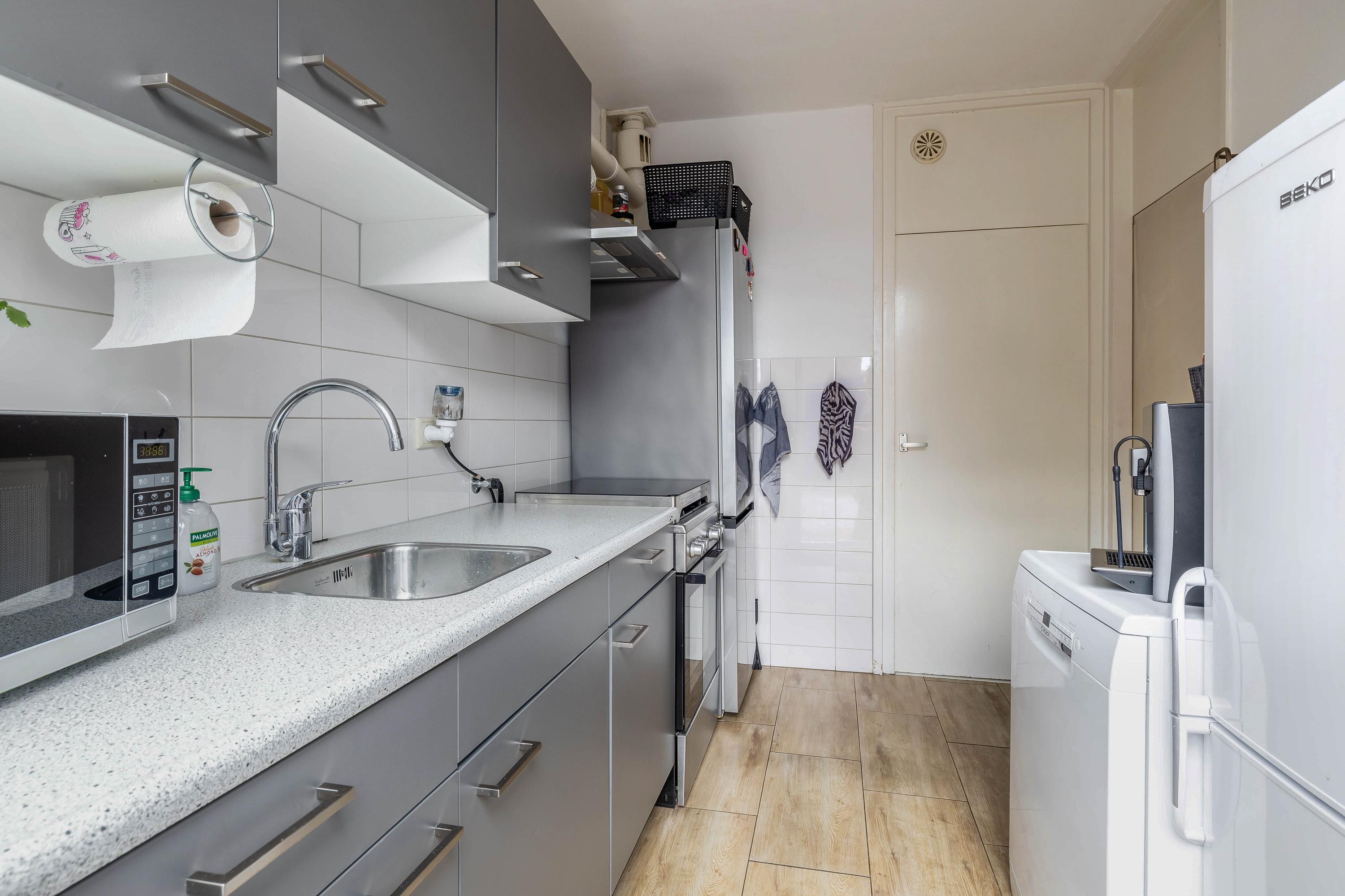 Tussenwoning te koop: Hugo de Grootstraat 142, Oude Pekela
