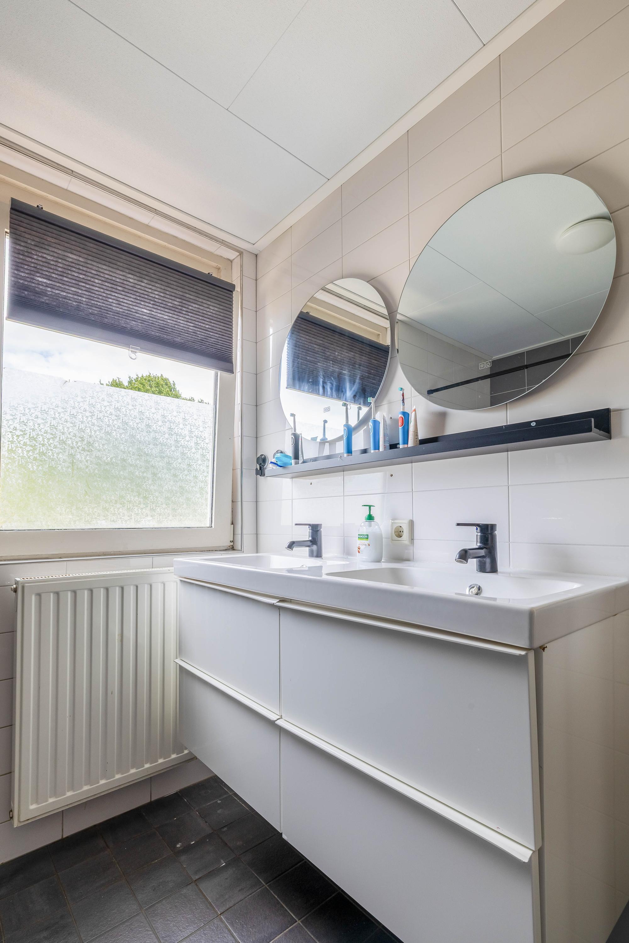 Tussenwoning te koop: Hugo de Grootstraat 142, Oude Pekela