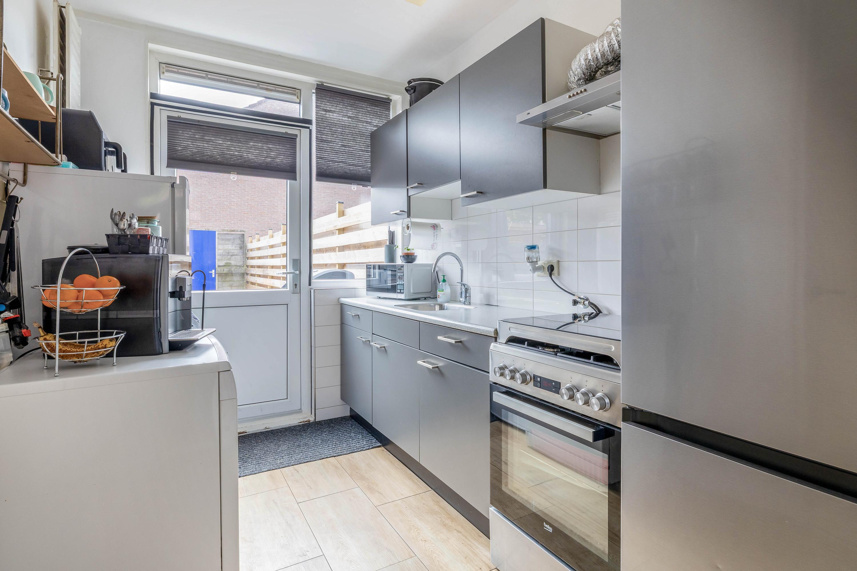 Tussenwoning te koop: Hugo de Grootstraat 142, Oude Pekela