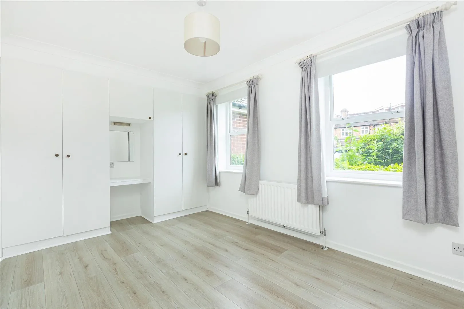 Flat Dovecote Gardens in Greater London