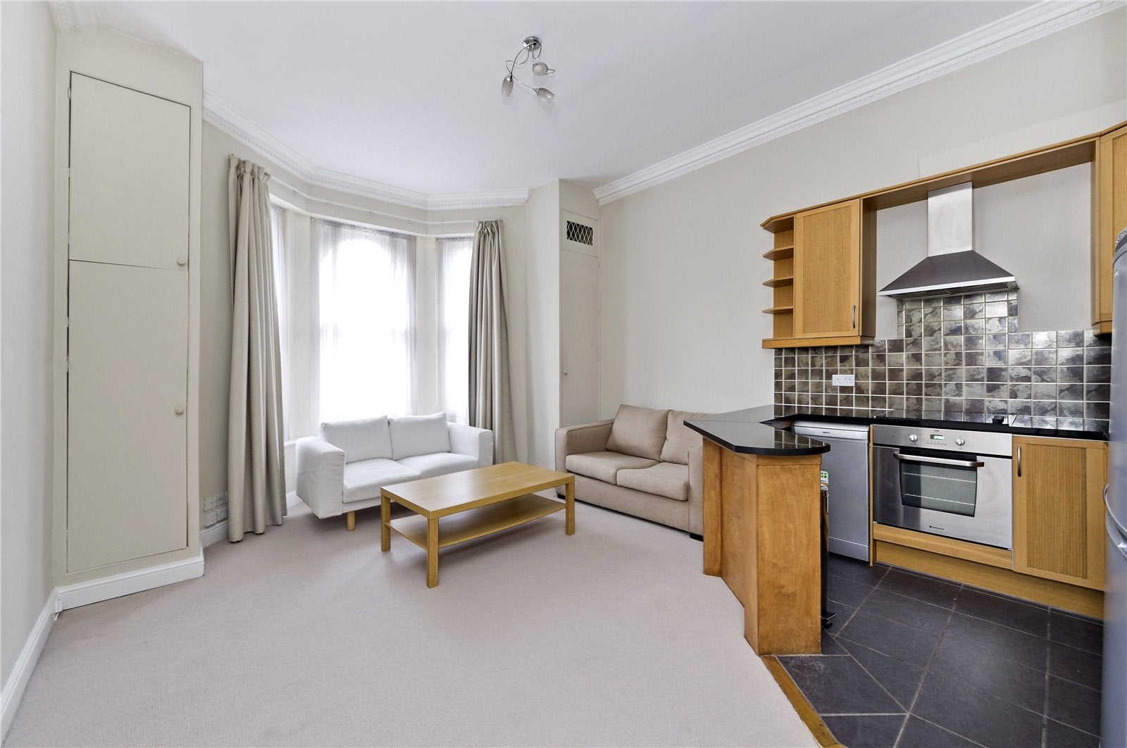 Flat Hornton Street in Greater London