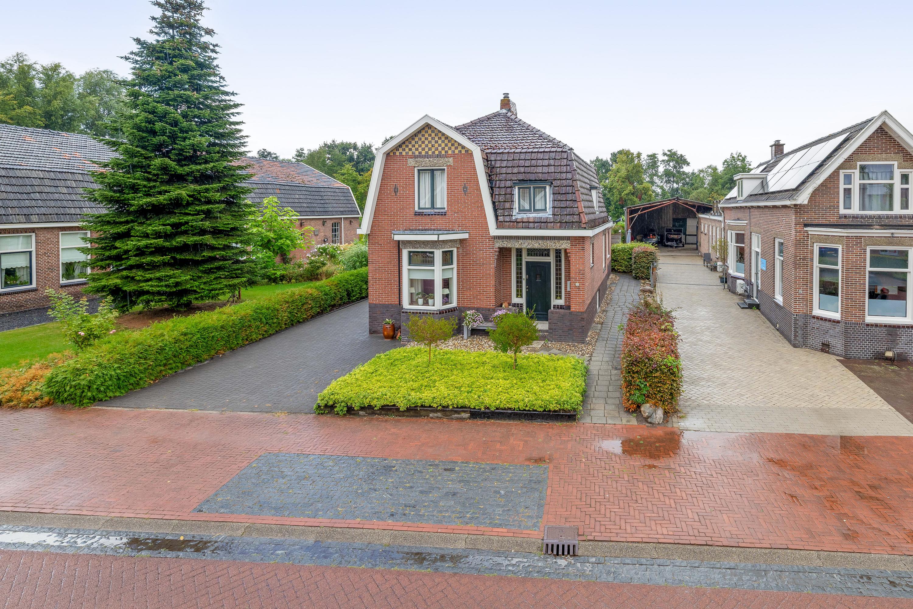 Vrijstaande woning te koop: Hoofdweg 155, Midwolda