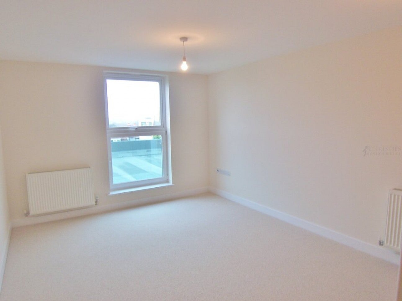 Flat Highbury Drive in Mole Valley
