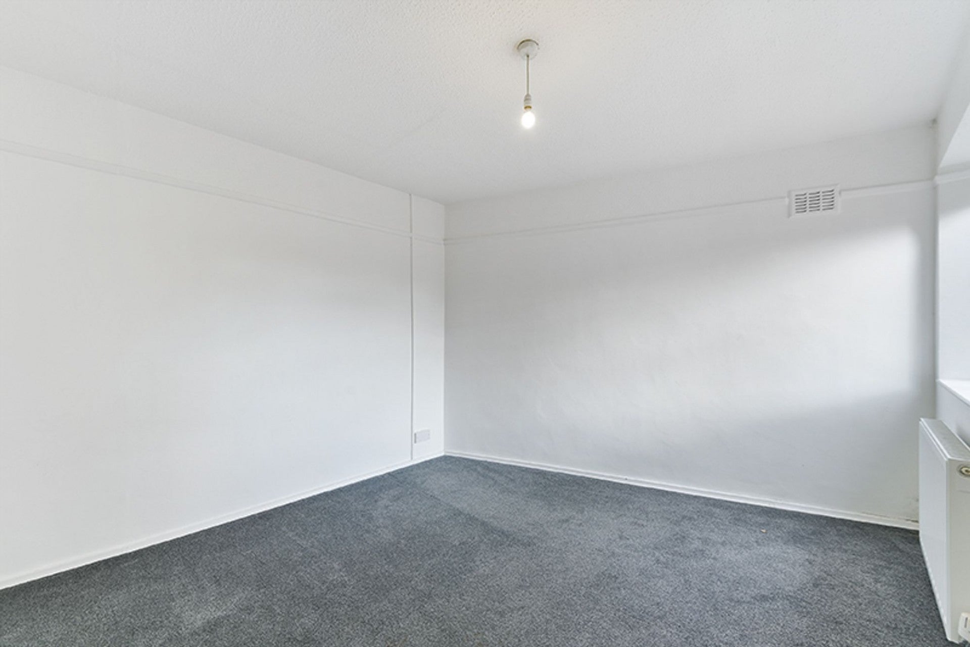 Flat Stainash Parade in Borough of Spelthorne