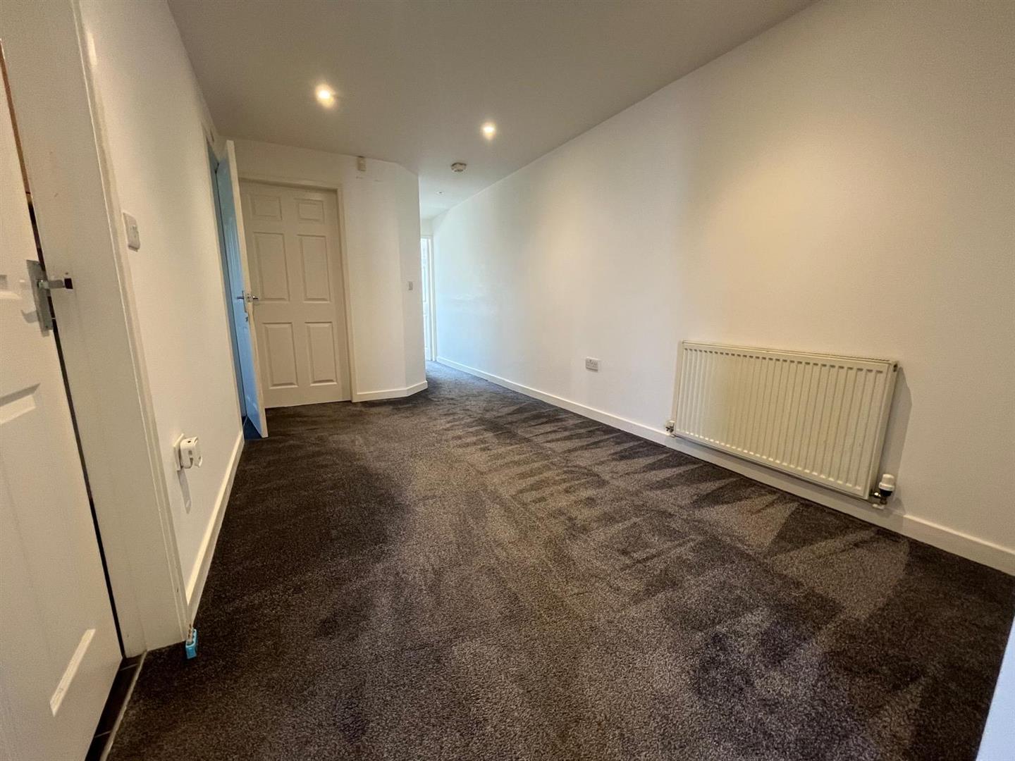 Flat Poplar Road in Mole Valley