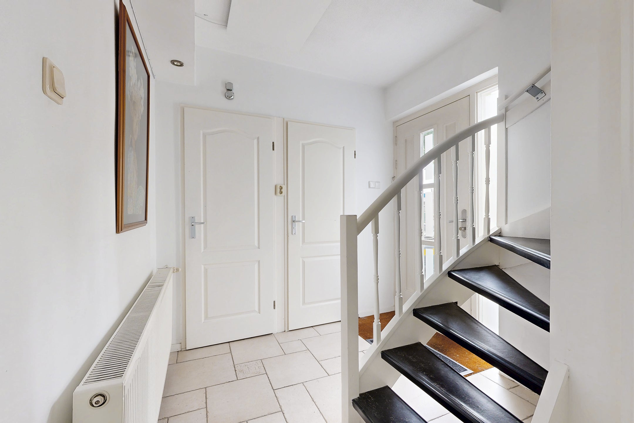 Tussenwoning te koop: Dr. Poelsstraat 23, Standdaarbuiten