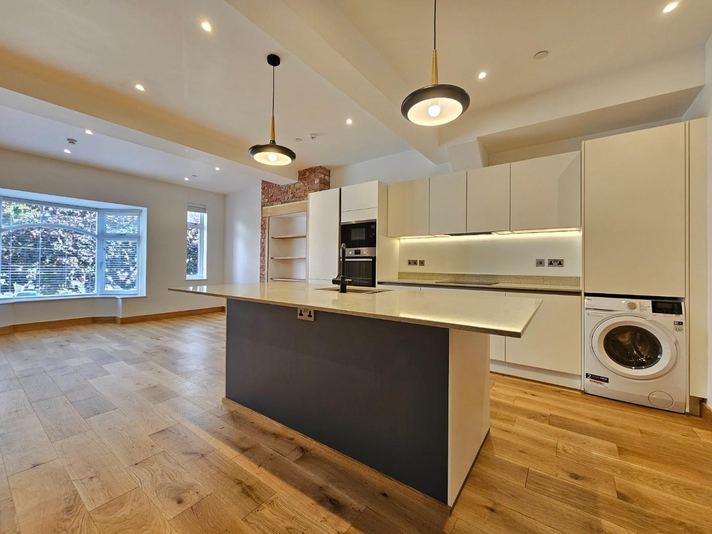 Flat Crown Passages in Trafford