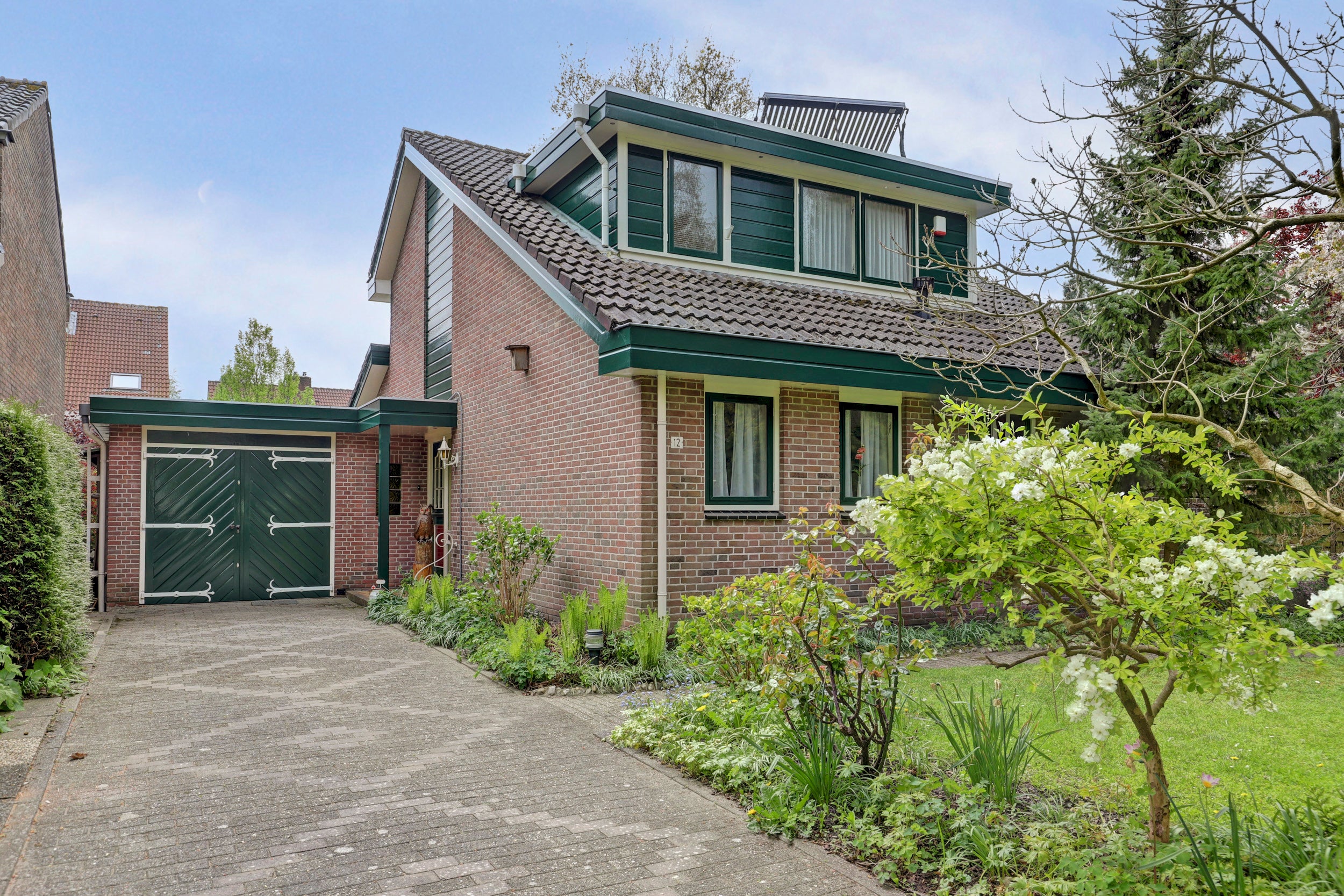 Vrijstaande woning te koop: De Ploeg 12, Hoogkarspel