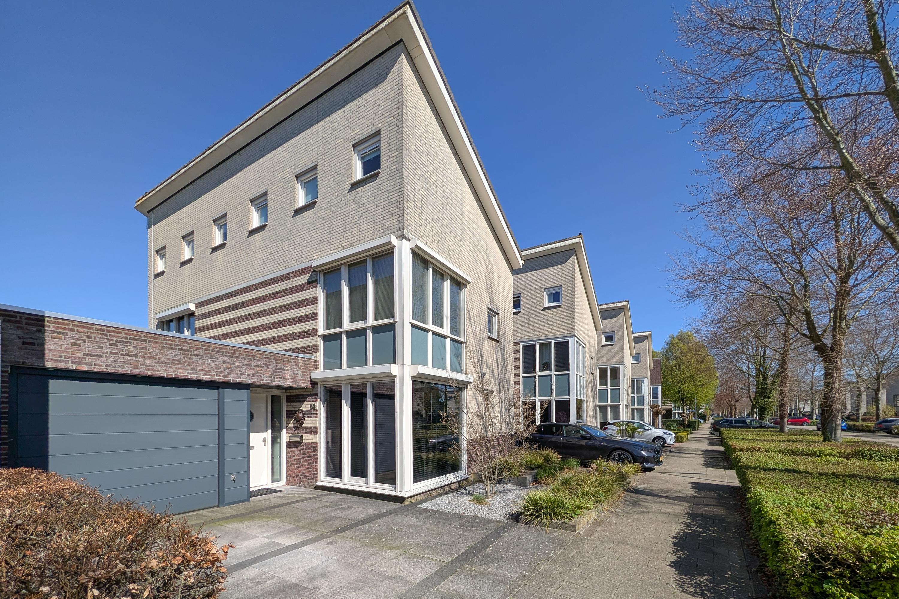 Tussenwoning te koop: Maasbommelstraat 53, Tilburg