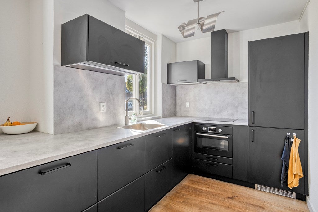 Tussenwoning te koop: Newtonlaan 52, Vlijmen