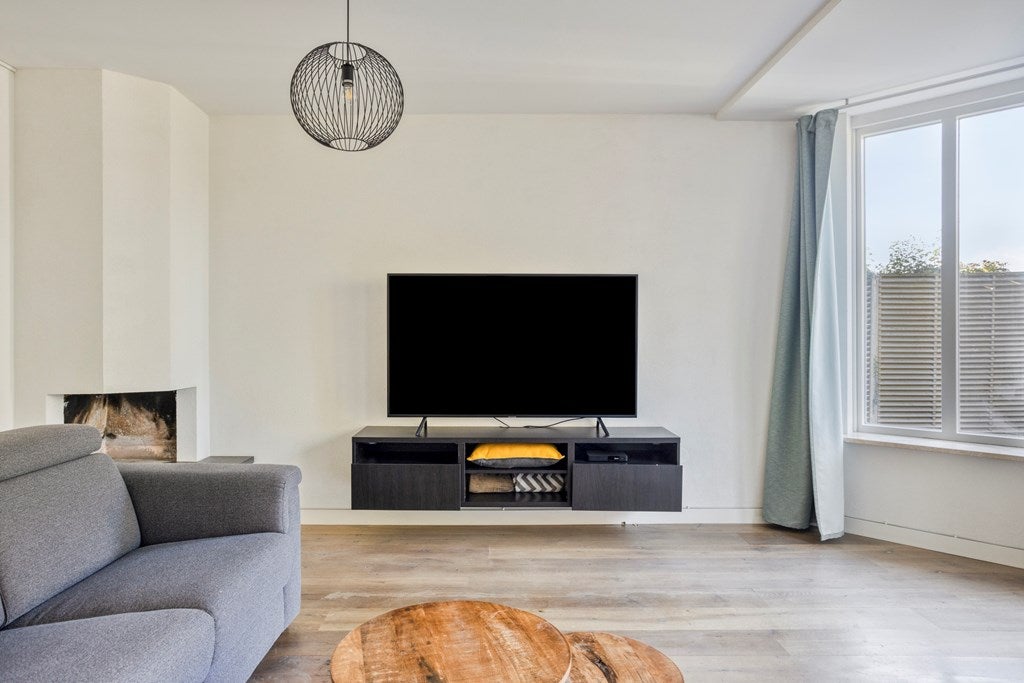 Tussenwoning te koop: Newtonlaan 52, Vlijmen